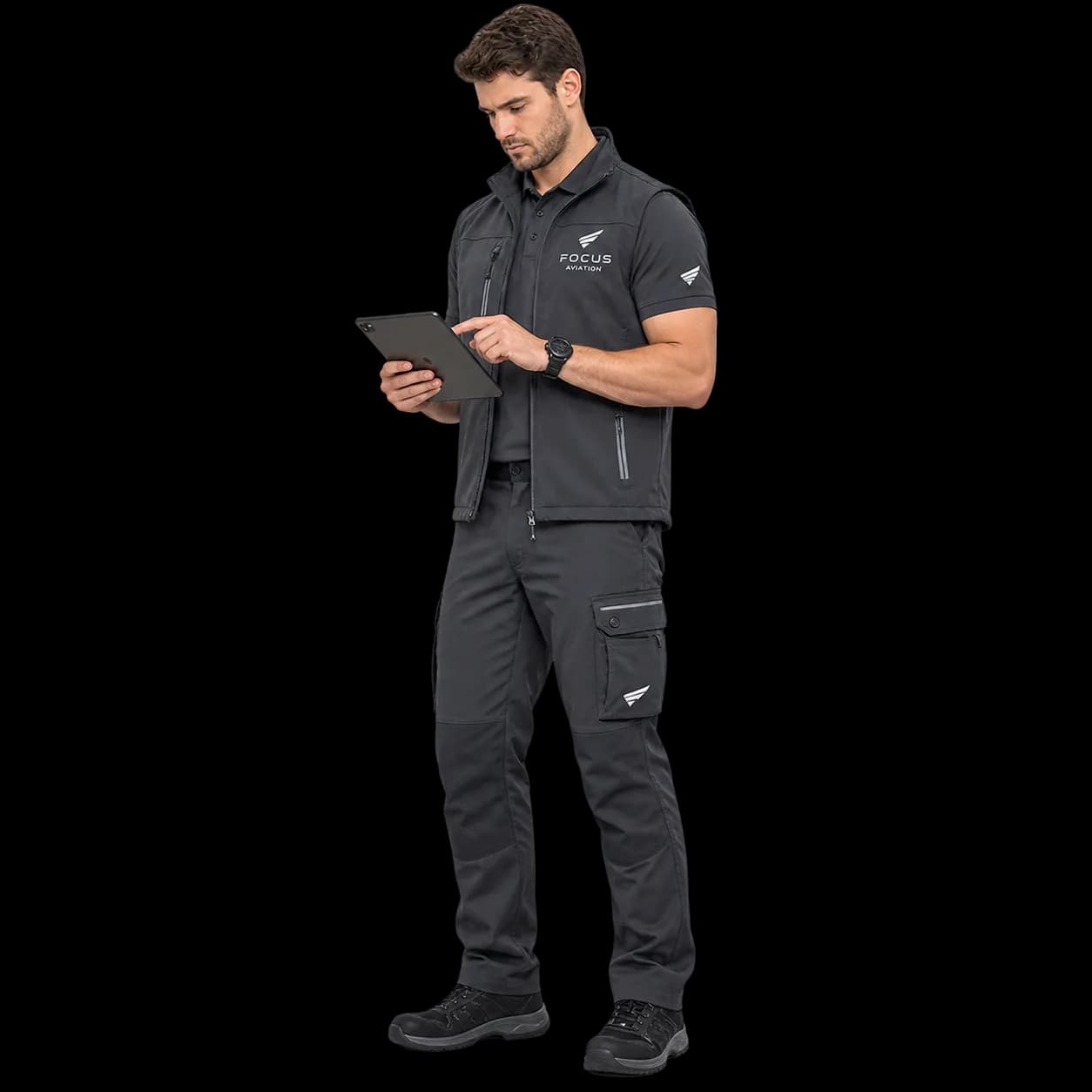 Focus Aviation technician in charcoal workwear reviewing diagnostics on a tablet